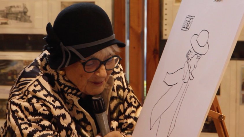 Pilarín Bayés dibuixant a Carme Font